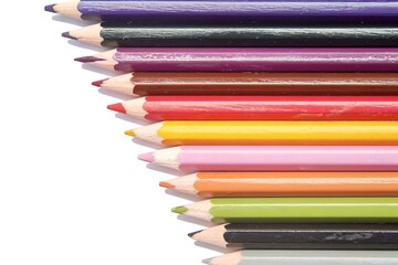 Close up shot of colorful pencils isolated on white background