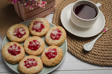 Cookies with tea on a light table