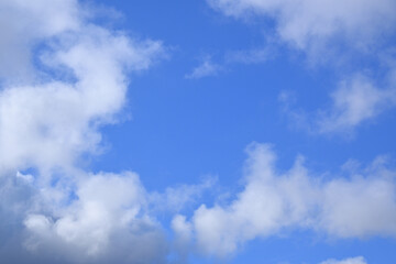 Fototapeta premium Clouds on blue sky, background or wallpaper