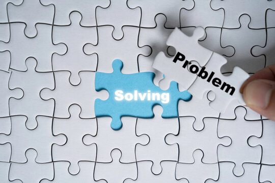 Hand move out problem wording on jigsaw and found solving wording for solution concept.