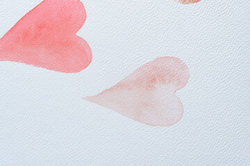 fading gradient hearts on textured paper