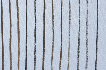 black fading lines on textured paper