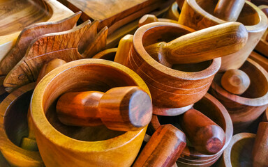 wooden mortar and other kitchen utensils souvenir shop Mexico.