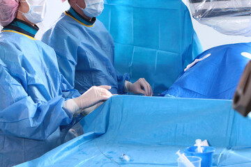 Operations on blood vessels. Endovascular surgery. Modern operating room. Concept of healthcare.