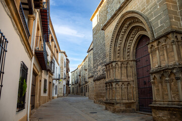 Typical street in the old town of Úbeda, Jaén, Andalusia, a World Heritage city, with the church of San Pablo in the foreground