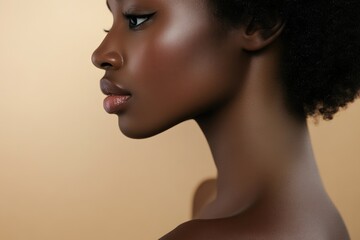 Fototapeta premium Profile view of black woman's shoulder in studio