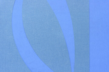 textured on smooth blue paper background with curvy and clean edges