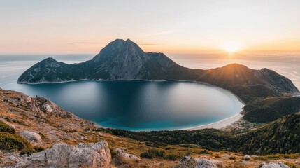 Naklejka premium Breathtaking sunset over rugged mountains and serene coastal waters