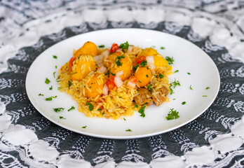 Traditional Brazilian dish rice, chicken and pequi (caryocar brasileinse) known as galinhada goiana
