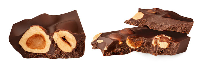 Broken  Chocolate pieces isolated on white. Dark organic Chocolate  with hazel nuts  close up