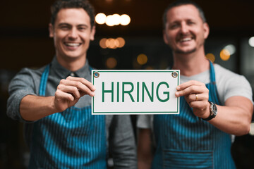 Portrait, business people and men with hiring sign, cooperation and startup with opportunity. Face, employees and entrepreneur with poster, billboard and symbol with information and collaboration