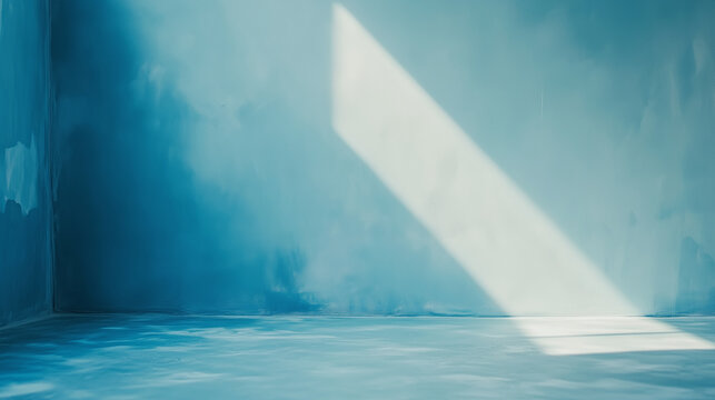 Wz&oacute;r o miękkich błękitnych tonach, kt&oacute;ry zdobi ściany nowoczesnego studia. Delikatne przejścia kolor&oacute;w tworzą wrażenie spokoju i zachęcają do kreatywności.