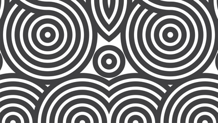 Each spiral is outlined in bold black lines, contrasting sharply against a crisp white background. The overall effect is both hypnotic and mesmerising, drawing the eye into the intricate details.