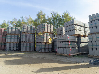 Stacked materials for curb construction at building site