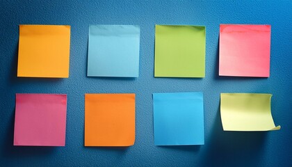 Fototapeta premium colorful sticky notes on a blue wall
