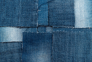 Texture from torn pieces of denim. Jeans texture. Material for sewing clothes