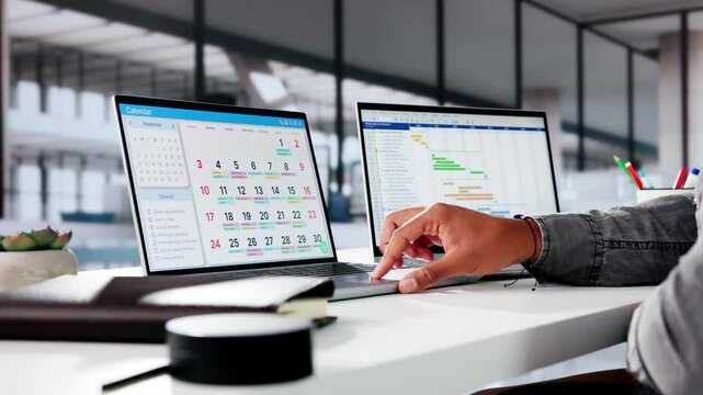Man Organizing Appointment Schedule Using Cellphone