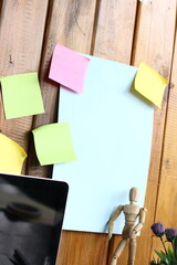 At office, collaborating on creative project, using sticky notes