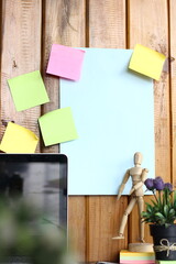 At office, collaborating on creative project, using sticky notes