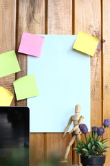 At office, collaborating on creative project, using sticky notes