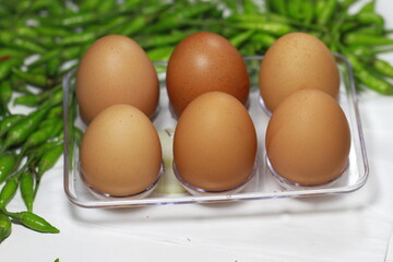 a few fresh chicken eggs 