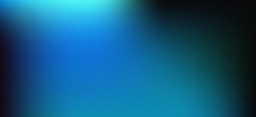 A soft, grainy abstract blur featuring shades of blue with a smooth gradient. The transition of light and dark tones creates a calming and dreamy visual effect, perfect for modern design backdrops.