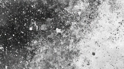 Abstract black and white splatter background texture.