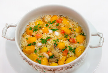 Traditional Brazilian dish rice, chicken and pequi (caryocar brasileinse) known as galinhada goiana