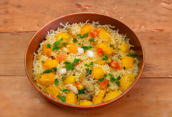 Traditional Brazilian dish rice, chicken and pequi (caryocar brasileinse) known as galinhada goiana