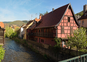 Colorful vintage houses. Authentic architecture in Riquewihr village, the Haut-Rhin department, ...