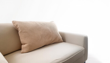 Beige blanket on the sofa on side position provides copy space for text. background concept isolated white