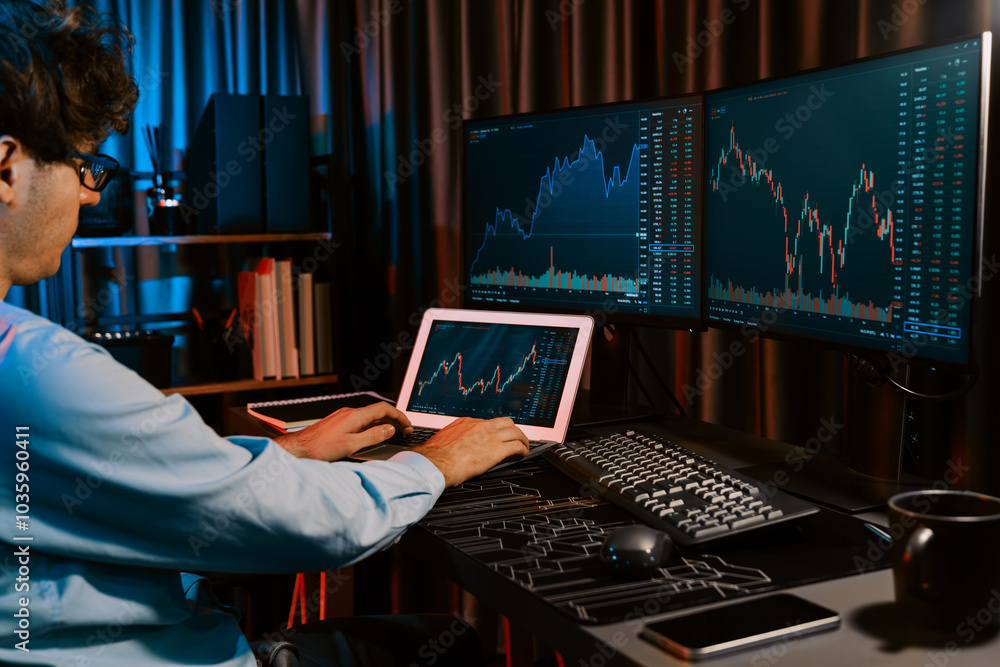 Poster young investor stock trader searching on laptop comparing with dynamic exchange rate screens of curr