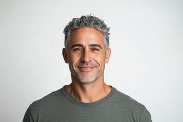 Fototapeta premium Portrait of a handsome, smiling man with gray hair.
