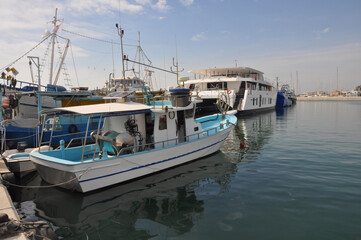 The Limassol Old Port with fishing boats and beautiful buildings in Cyprus