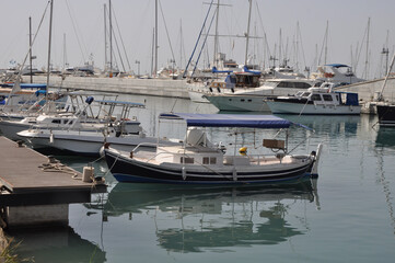 Fototapeta premium The Limassol Old Port with fishing boats and beautiful buildings in Cyprus