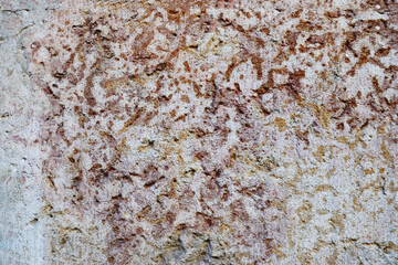 Brown stone wall close up.