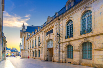 Obraz premium Palace of the Dukes and Estates of Burgundy Bourgogne Palais building on Rue Rameau street in Dijon city historical centre in evening twilight, Dijon old town, Bourgogne-Franche-Comte region, France