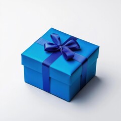 Obraz premium Elegant blue gift box with matching ribbon on a clean white background