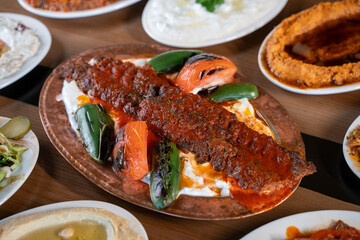 Traditional Turkish kebab on the table, Adana kebab.