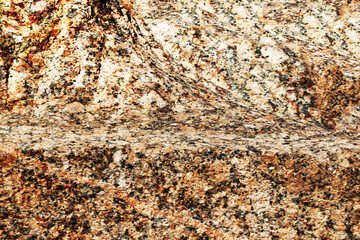 The surface of a large granite stone.