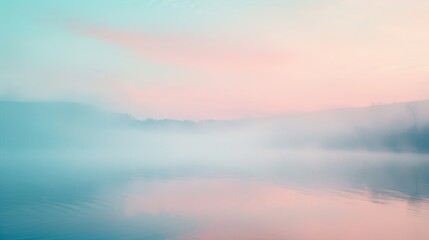 Fototapeta premium The soft morning mist envelops the landscape in a gradient of dusty rose rosy mauve and powdery blue creating a dreamy atmosphere