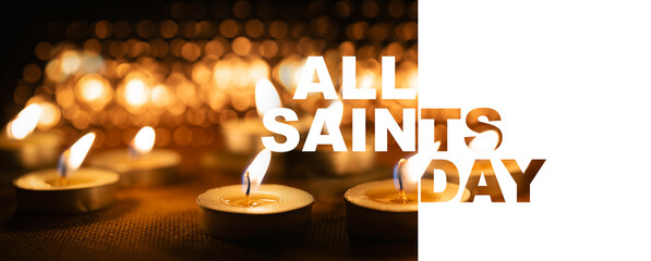 All Saints' Day panoramic banner with bokeh effect. All Hallows' Day. Solemnity of All Saints. Candles with fire on shiny background with text on white