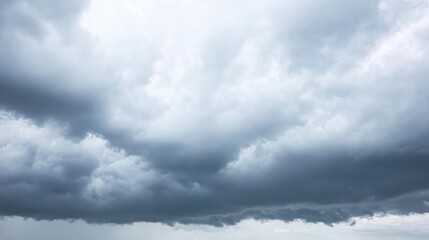 Obraz premium Dramatic Storm Clouds Gathering in the Sky