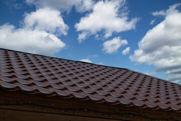Metal tile.Roof for the house. Modern coatings for the roof of the house.