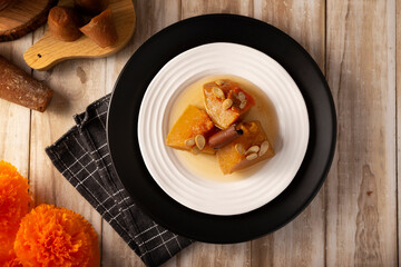 Calabaza en Tacha. Spiced Candied Pumpkin. Mexican dessert whose main ingredients are pumpkin and piloncillo, also known as Chacualole or Calabaza en dulce, widely used in Day of the Dead offerings.