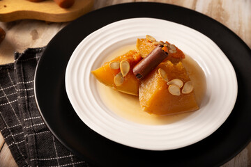 Calabaza en Tacha. Spiced Candied Pumpkin. Mexican dessert whose main ingredients are pumpkin and piloncillo, also known as Chacualole or Calabaza en dulce, widely used in Day of the Dead offerings.