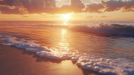 Fototapeta premium Beautiful sunset over the ocean, reflecting orange hues on the sandy beach as waves gently lap against the shore