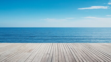 The wooden walkway welcomes visitors to enjoy the tranquil ocean and clear skies