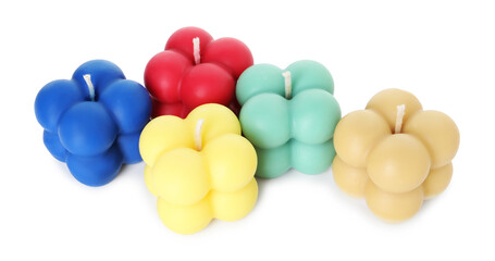 Many colorful bubble candles isolated on white