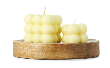 Beautiful yellow bubble candles isolated on white